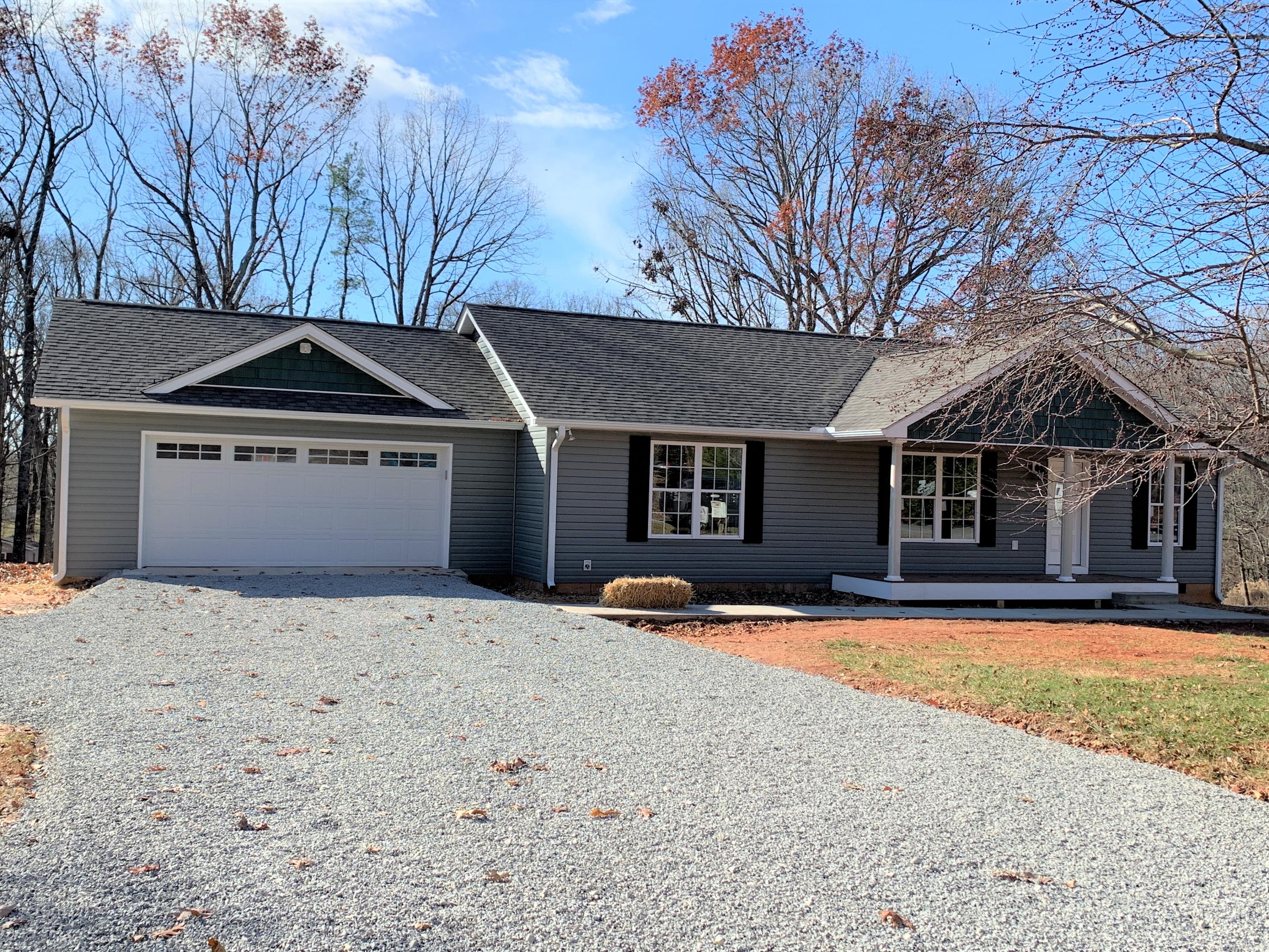 2731 Edwardsville Road Hardy, VA 24101 - Photo 1 of 45 a front view of a house with trees and yard