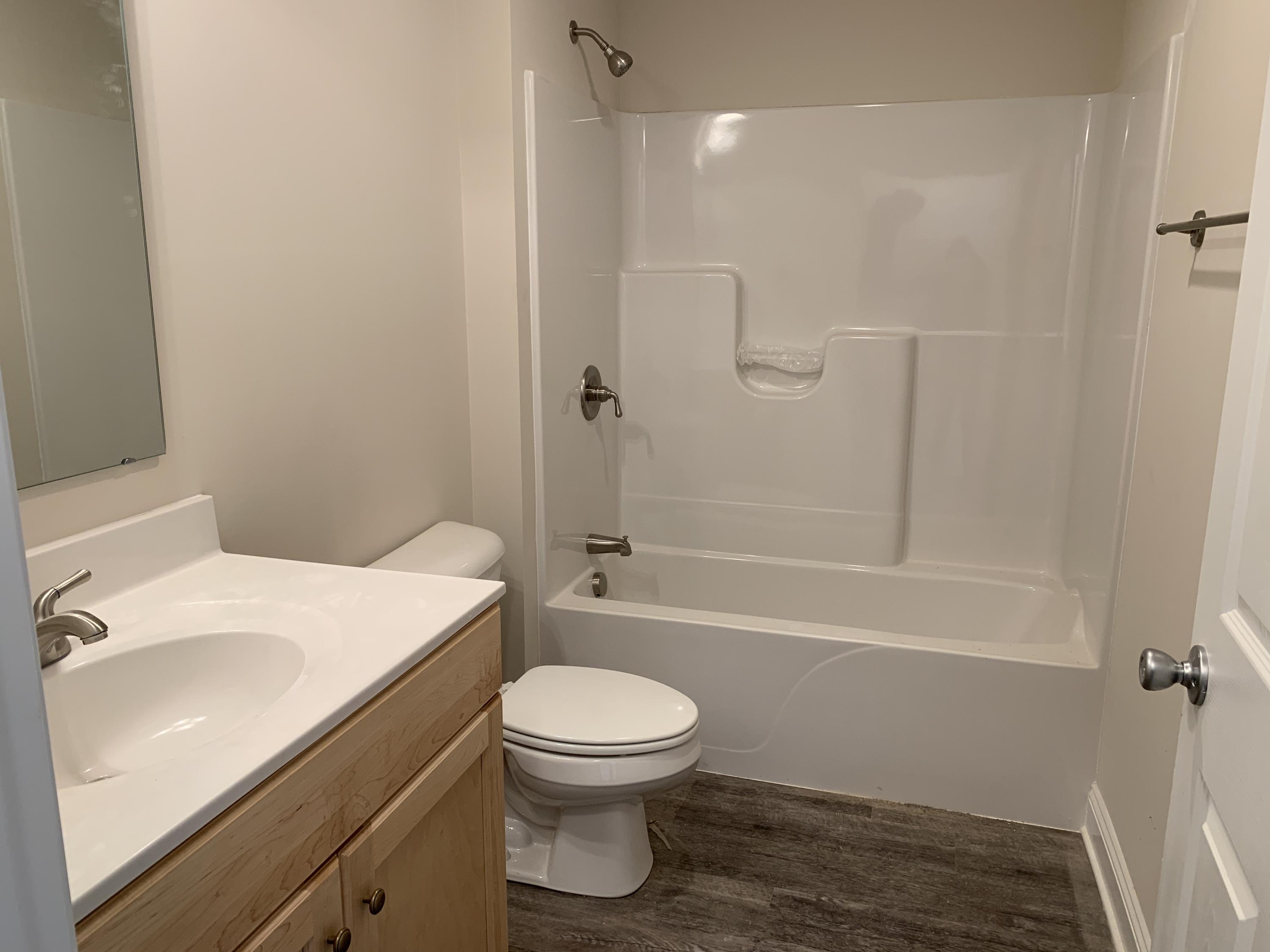 2731 Edwardsville Road Hardy, VA 24101 - Photo 12 of 45 a bathroom with a sink a toilet and shower