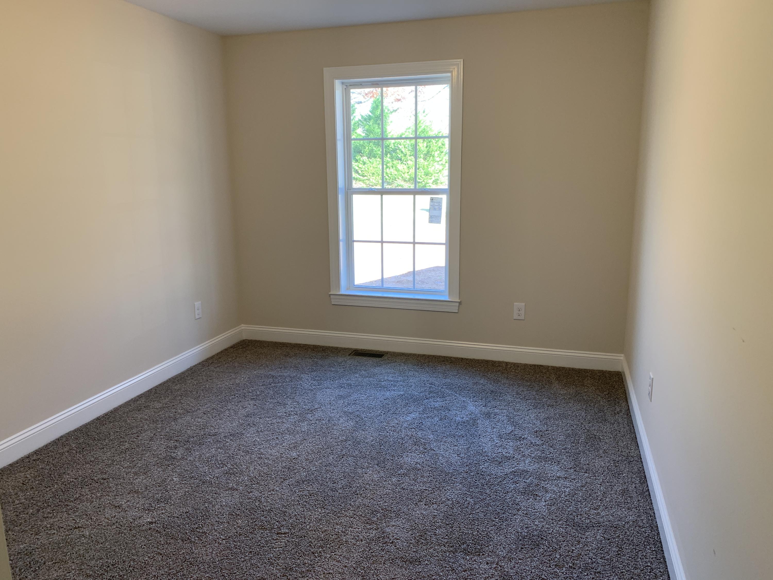 2731 Edwardsville Road Hardy, VA 24101 - Photo 13 of 45 an empty room with a window