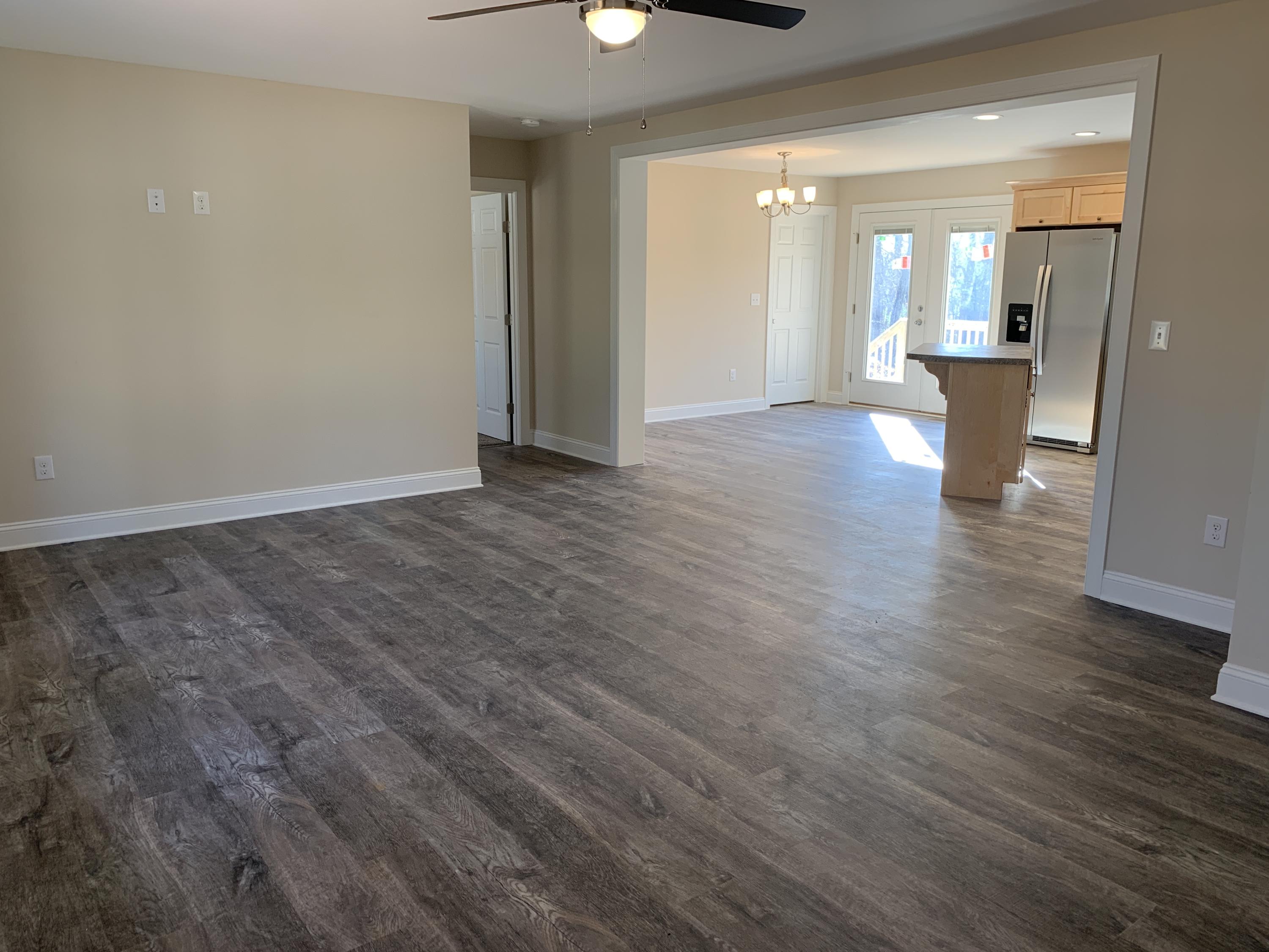 2731 Edwardsville Road Hardy, VA 24101 - Photo 24 of 45 a view of a big room with wooden floor and windows