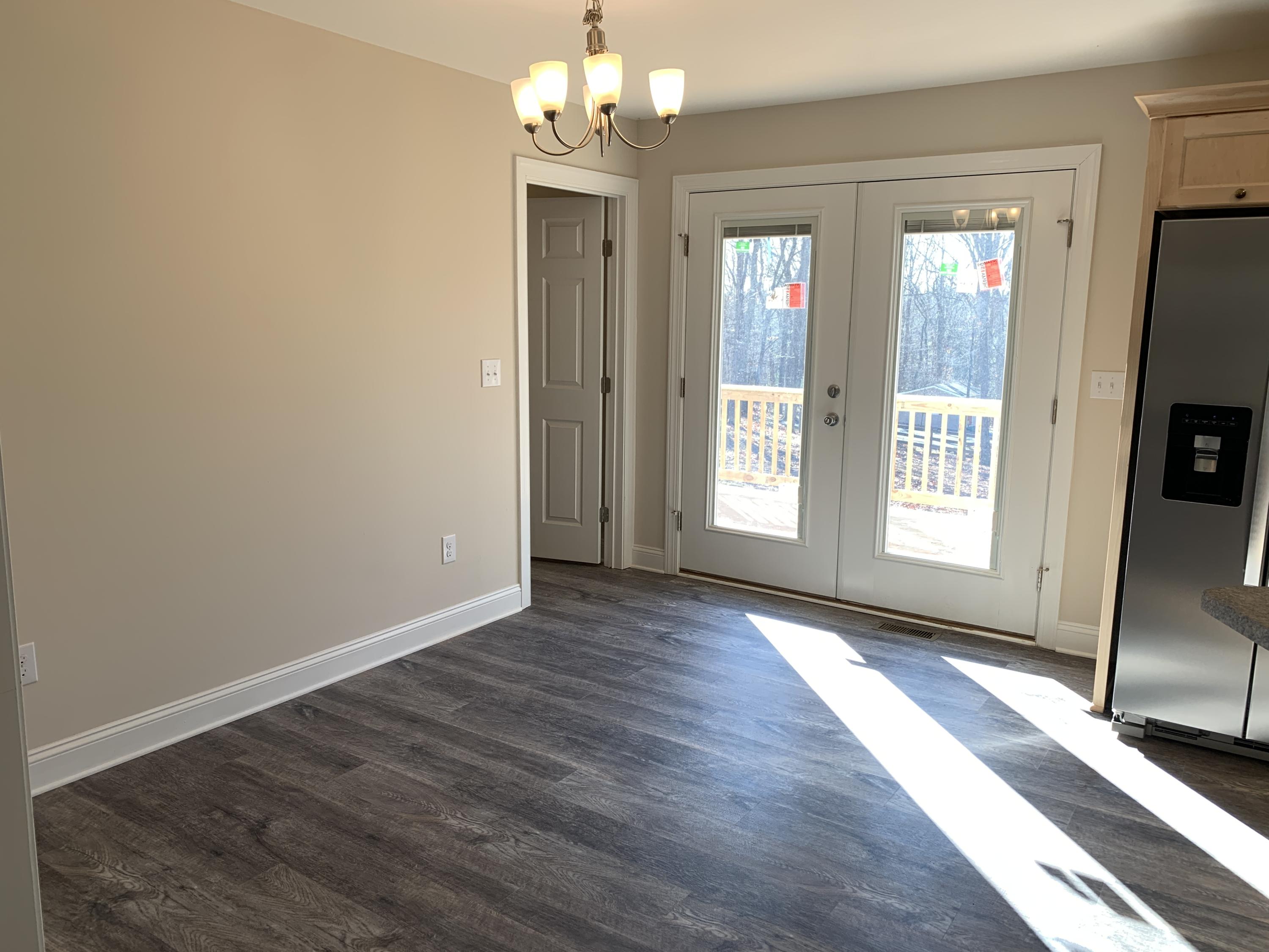 2731 Edwardsville Road Hardy, VA 24101 - Photo 28 of 45 a view of an empty room with window and wooden floor