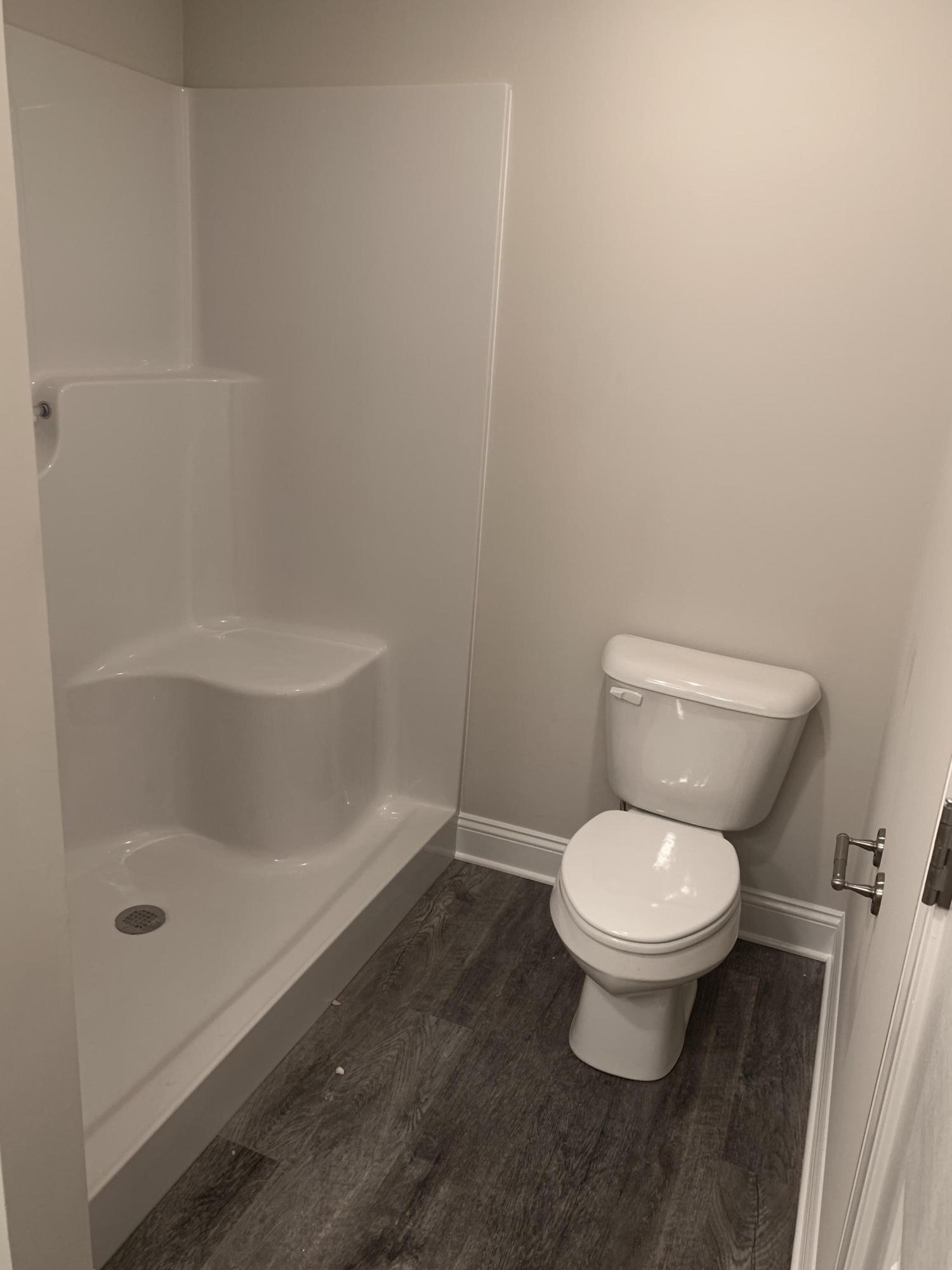 2731 Edwardsville Road Hardy, VA 24101 - Photo 33 of 45 a white toilet sitting next to a bath tub