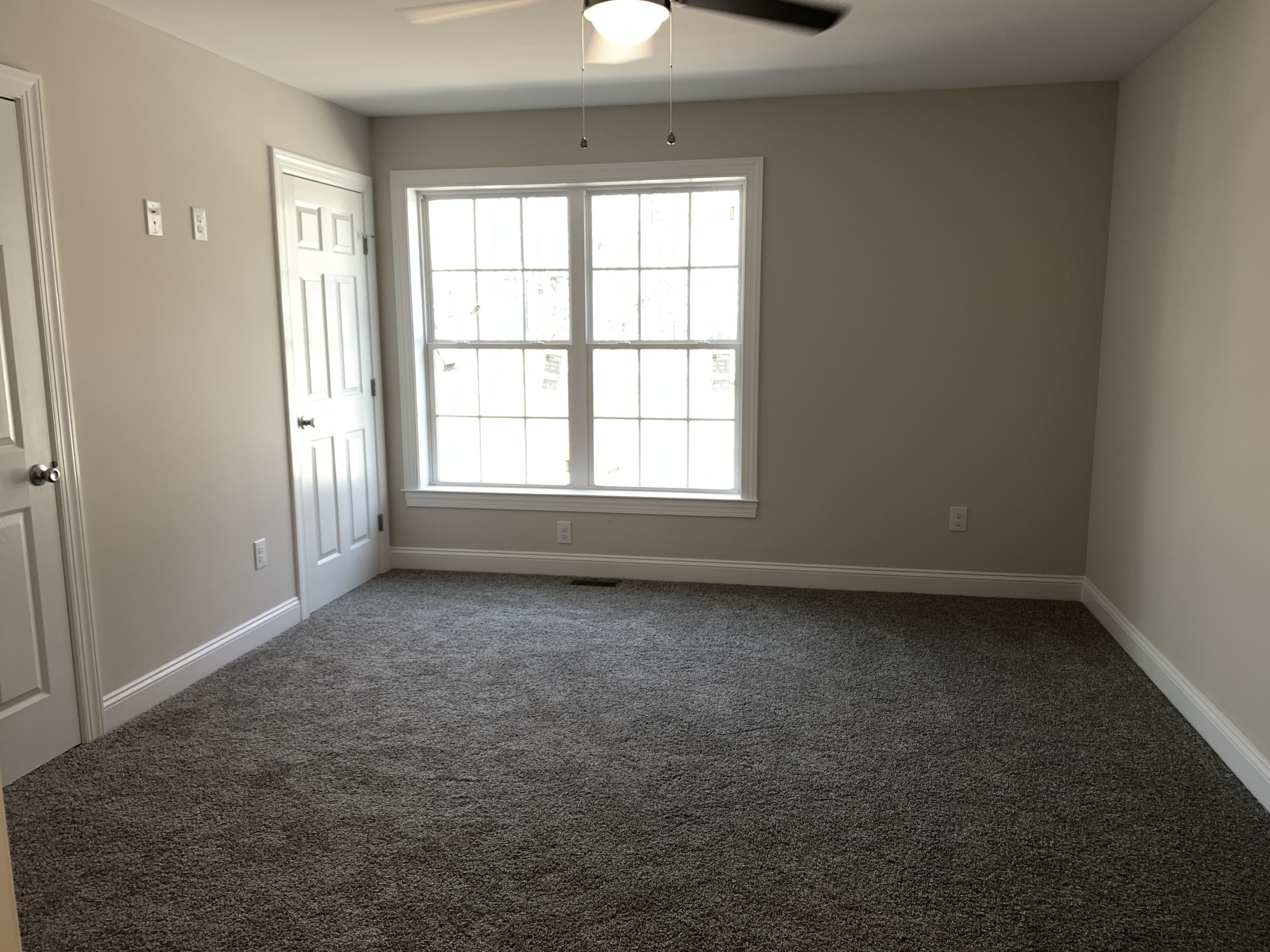 2731 Edwardsville Road Hardy, VA 24101 - Photo 6 of 45 an empty room with a empty space and windows