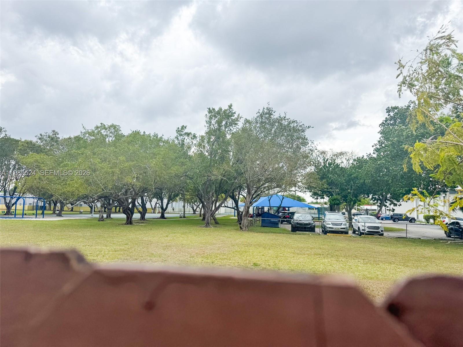 9635 Southwest 74th Street Miami, FL 33173 - Photo 41 of 44 Backyard faces Sunset Park with easy access backyard gate.