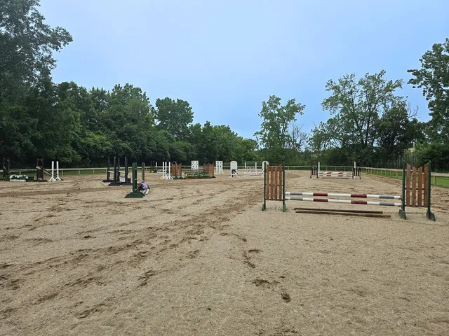 a view of a chair and table in the balcony