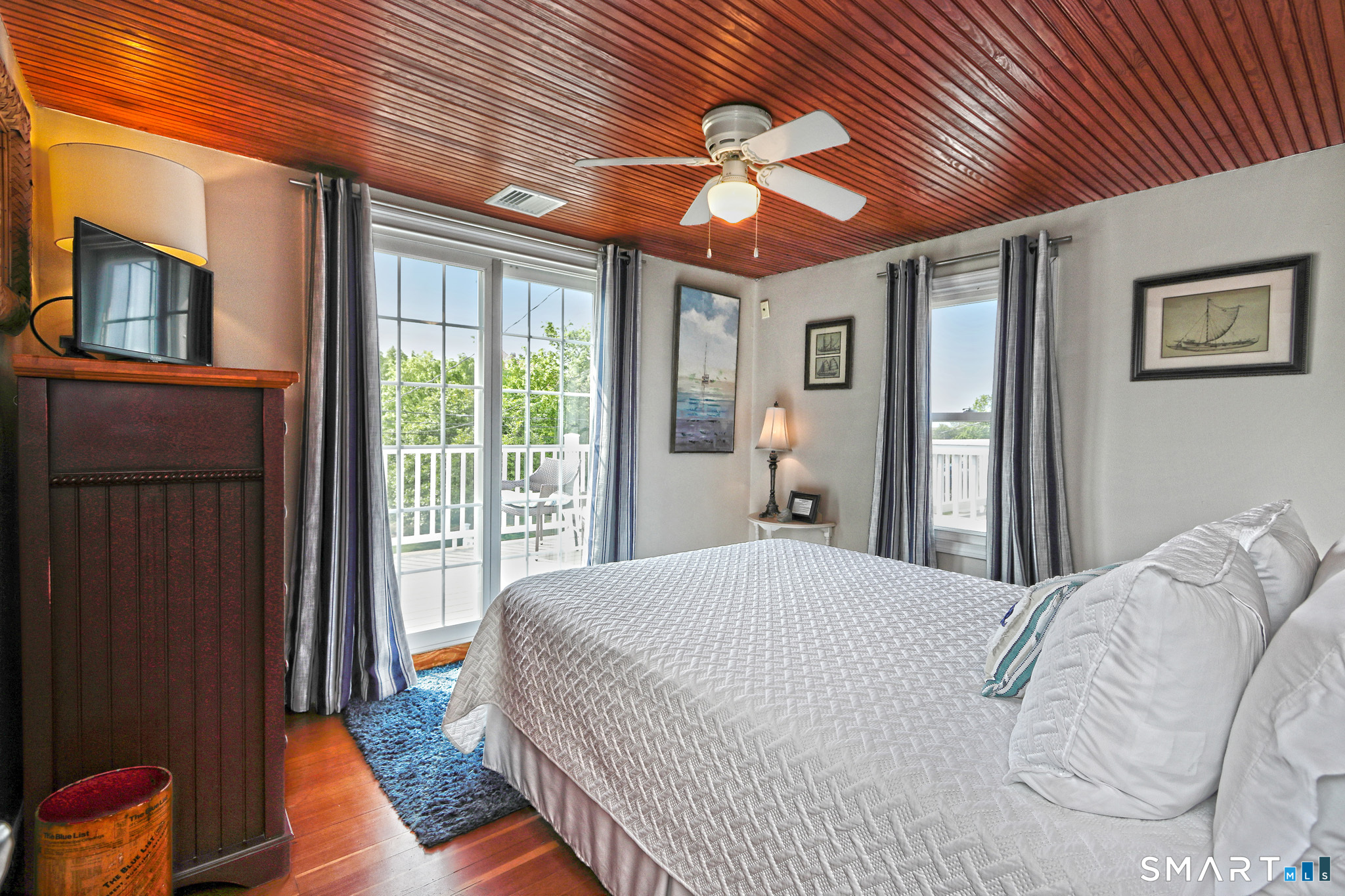 13 Billows Road Old Saybrook, CT 06475 - Photo 20 of 34 Bedroom with sliders to deck. Queen bed.