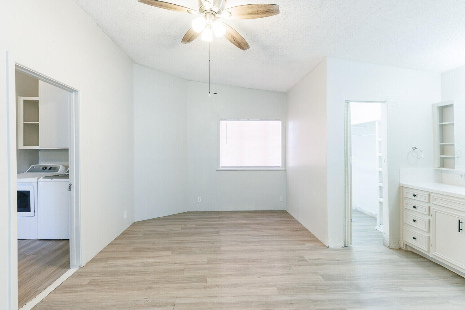 4402 44th Street Lubbock, TX 79414 - Photo 14 of 34 wooden floor in an empty room with a window
