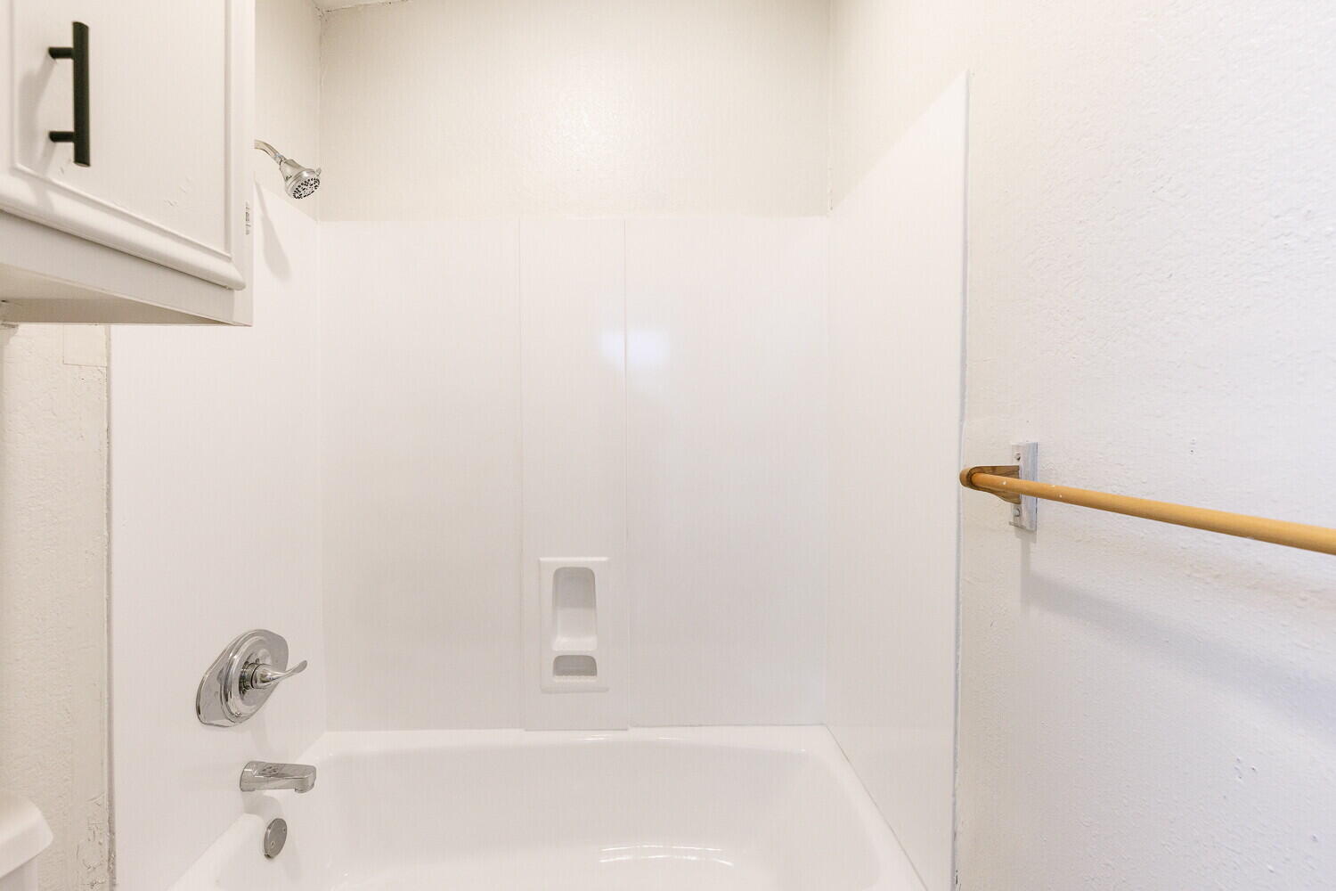4402 44th Street Lubbock, TX 79414 - Photo 19 of 34 a bathroom with a bathtub