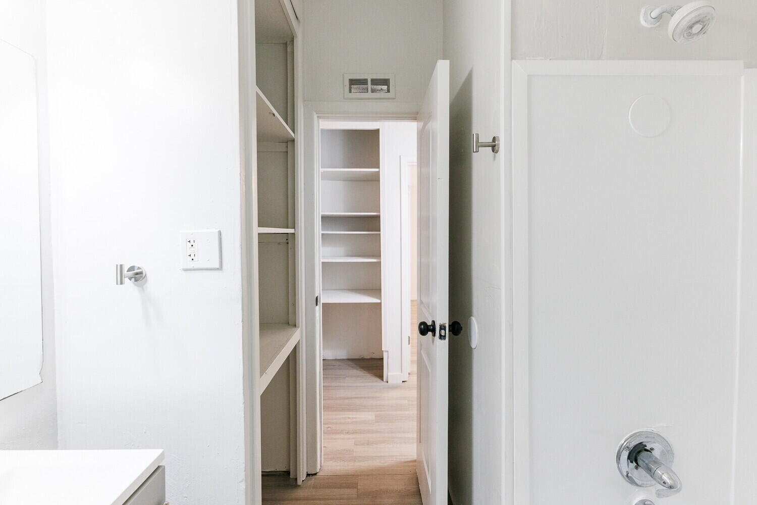 4402 44th Street Lubbock, TX 79414 - Photo 26 of 34 a view of a hallway with wooden floor and closet