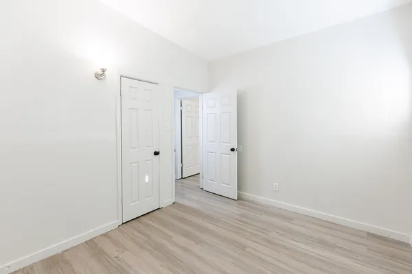 a view of a room that has a window in it