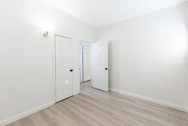 a view of a room that has a window in it