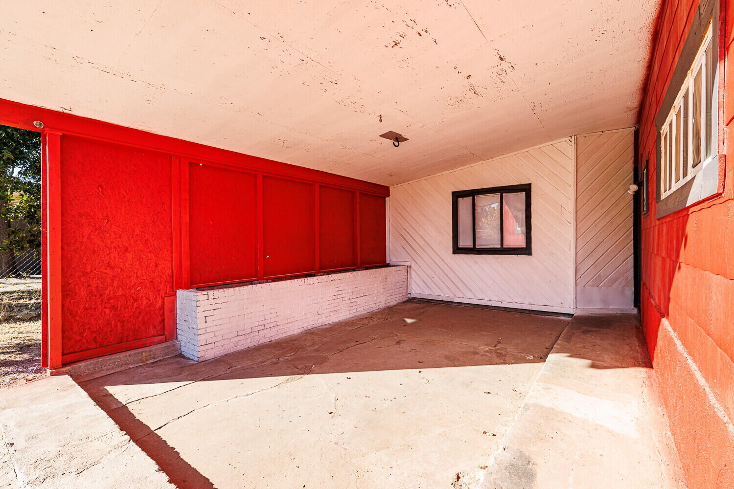 4402 44th Street Lubbock, TX 79414 - Photo 3 of 34 a view of an empty room with a window