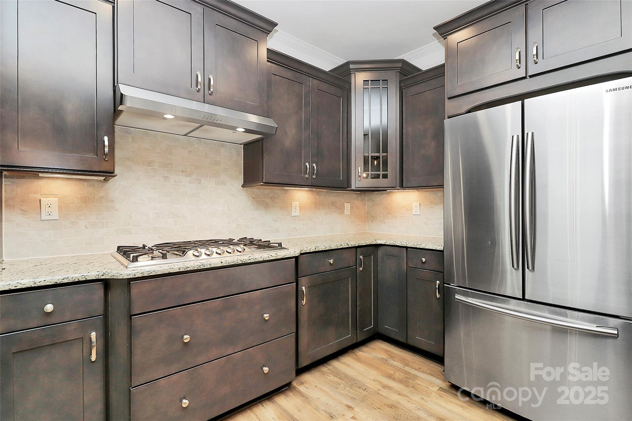 1093 Baldwin Drive Lancaster, SC 29720 - Photo 11 of 42 a kitchen with stainless steel appliances granite countertop a refrigerator and a stove