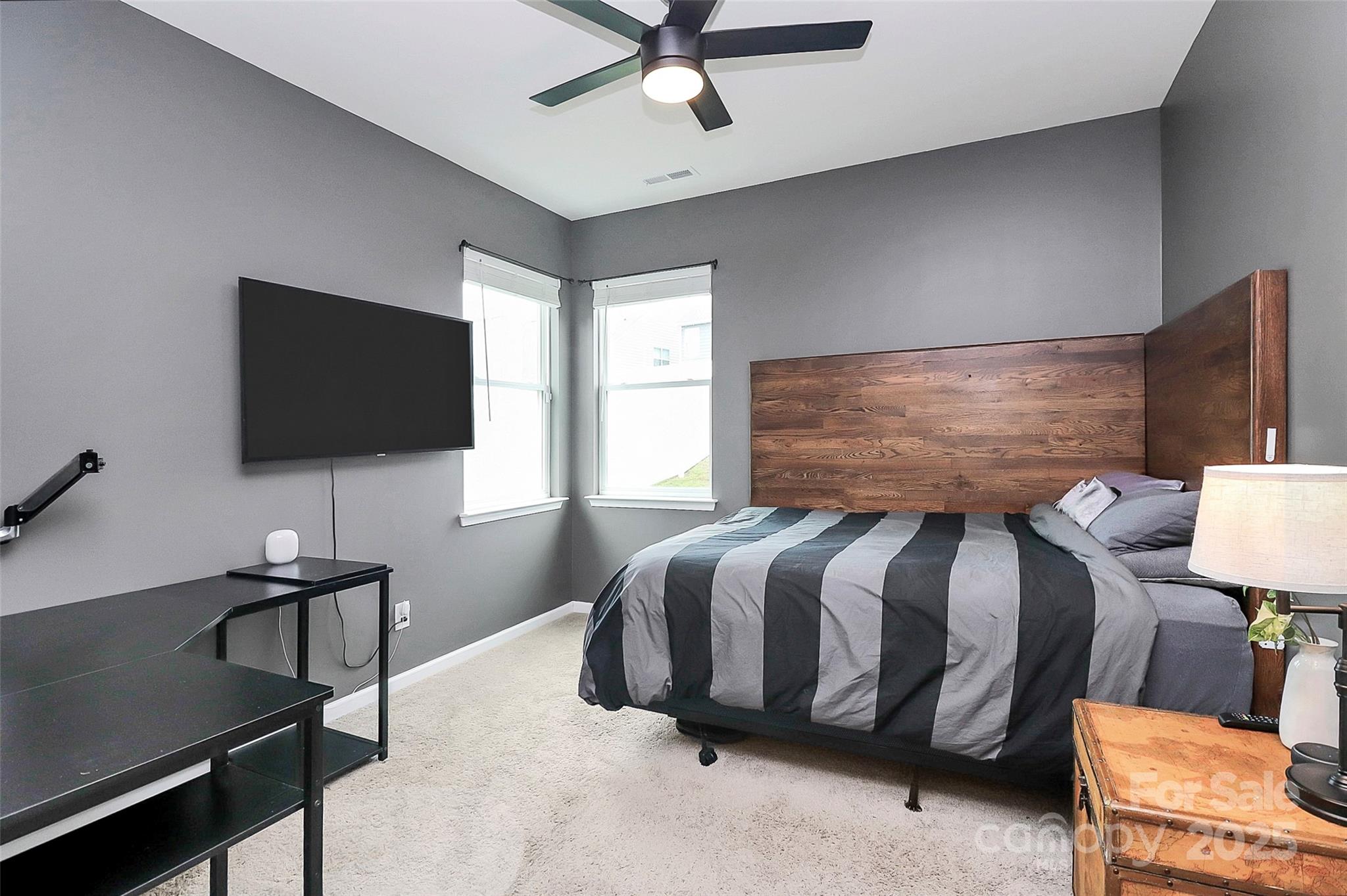 1093 Baldwin Drive Lancaster, SC 29720 - Photo 19 of 42 a living room with a bed furniture and a flat screen tv