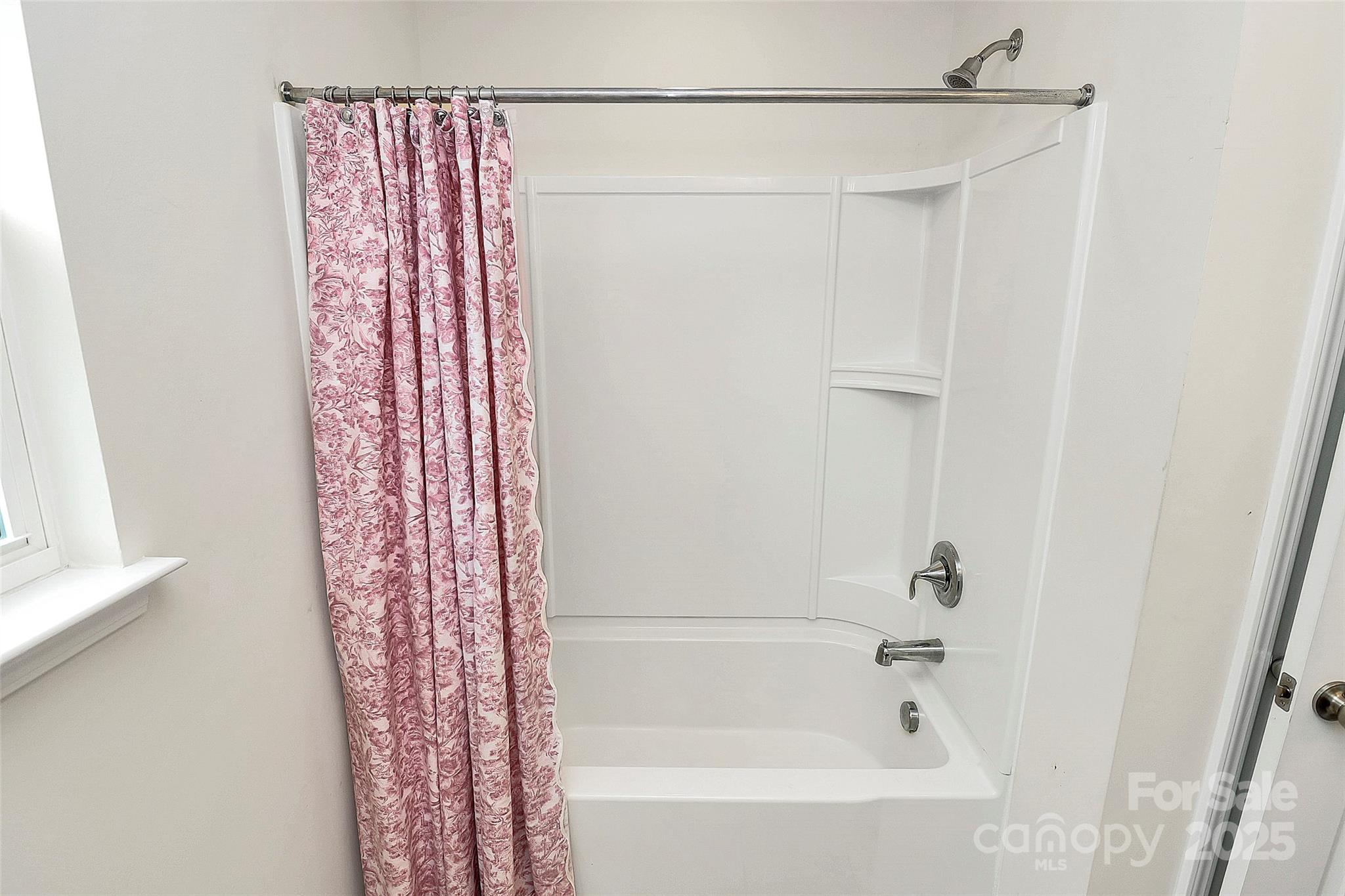 1093 Baldwin Drive Lancaster, SC 29720 - Photo 29 of 42 a bathroom with a bathtub and shower