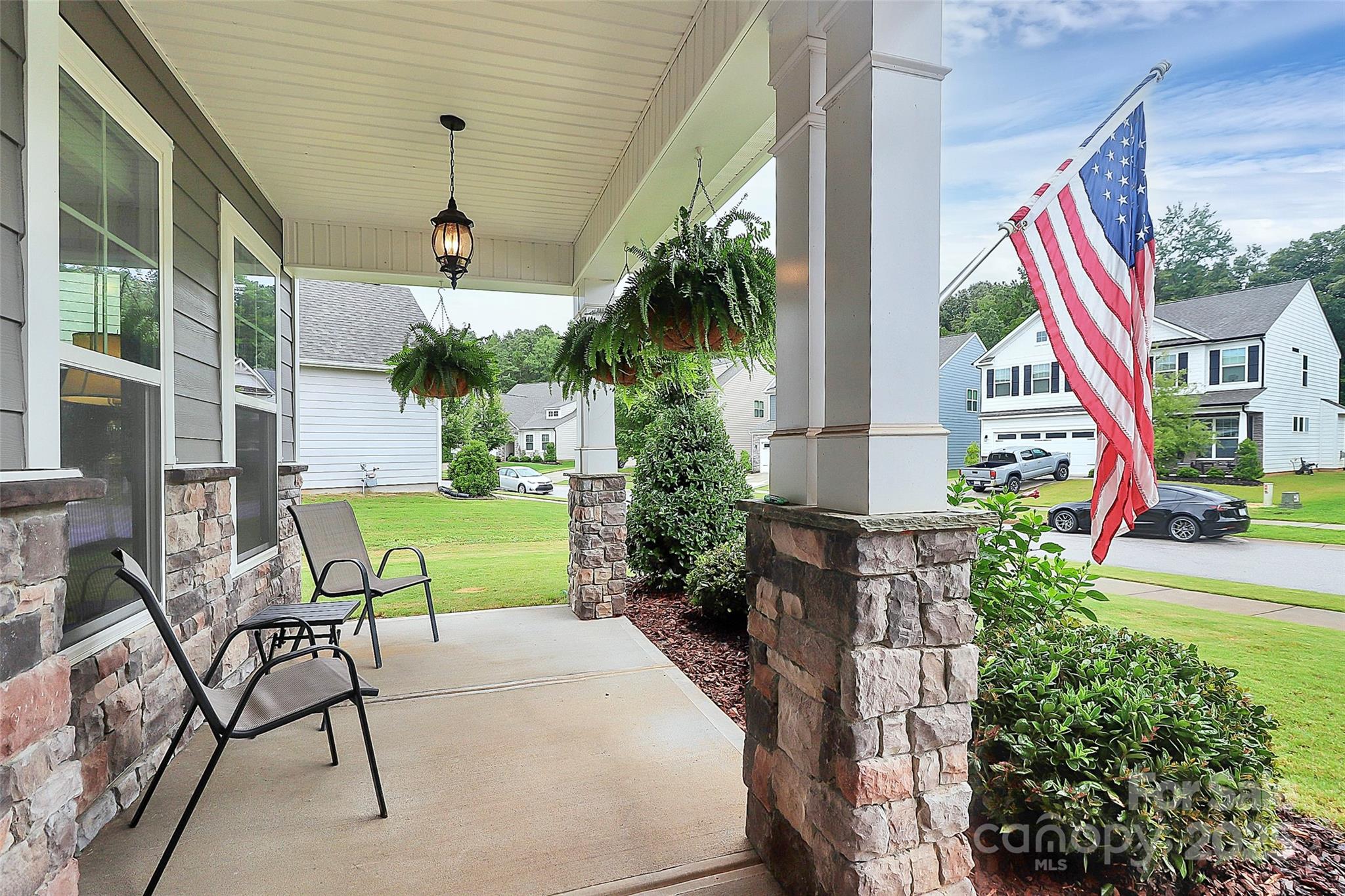 1093 Baldwin Drive Lancaster, SC 29720 - Photo 3 of 42 a house view with a garden and outdoor seating