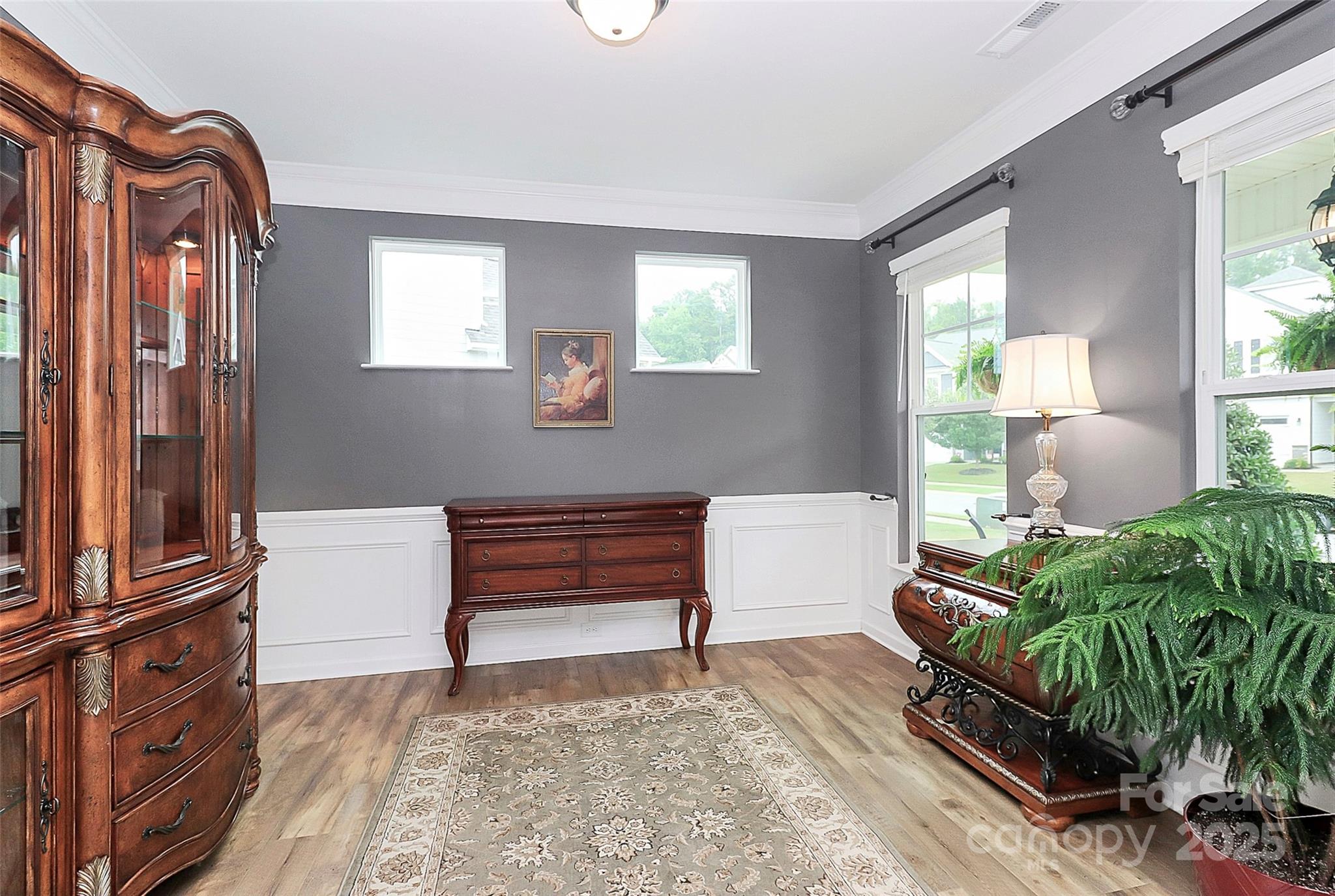 1093 Baldwin Drive Lancaster, SC 29720 - Photo 5 of 42 a room with furniture and a potted plant