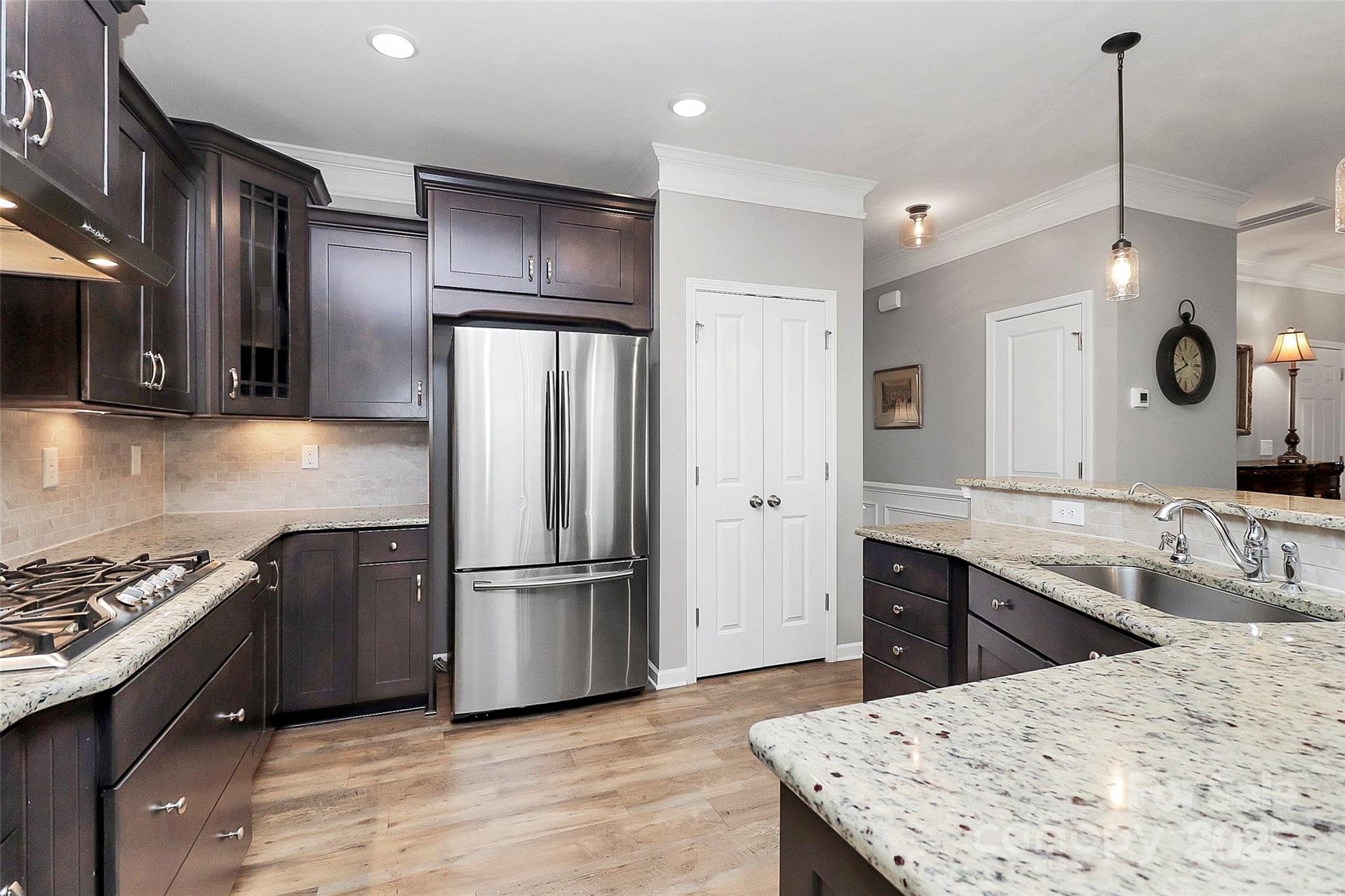 1093 Baldwin Drive Lancaster, SC 29720 - Photo 9 of 42 a kitchen with a refrigerator and a sink