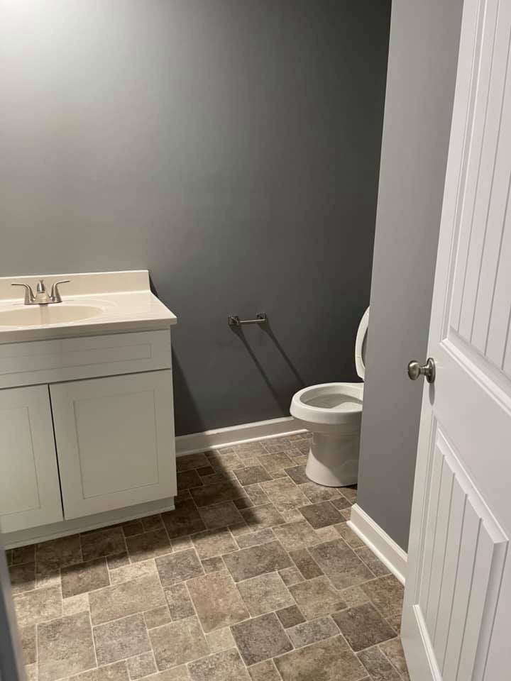 130 Main Street South, Unit 1 Carthage, TN 37030 - Photo 7 of 9 a bathroom with a sink and a toilet