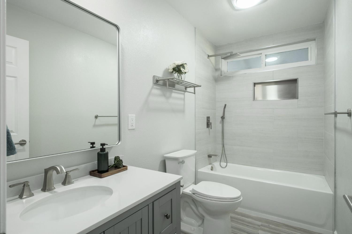 3062 Jasper Street Selma, CA 93662 - Photo 19 of 26 a bathroom with a sink toilet and shower