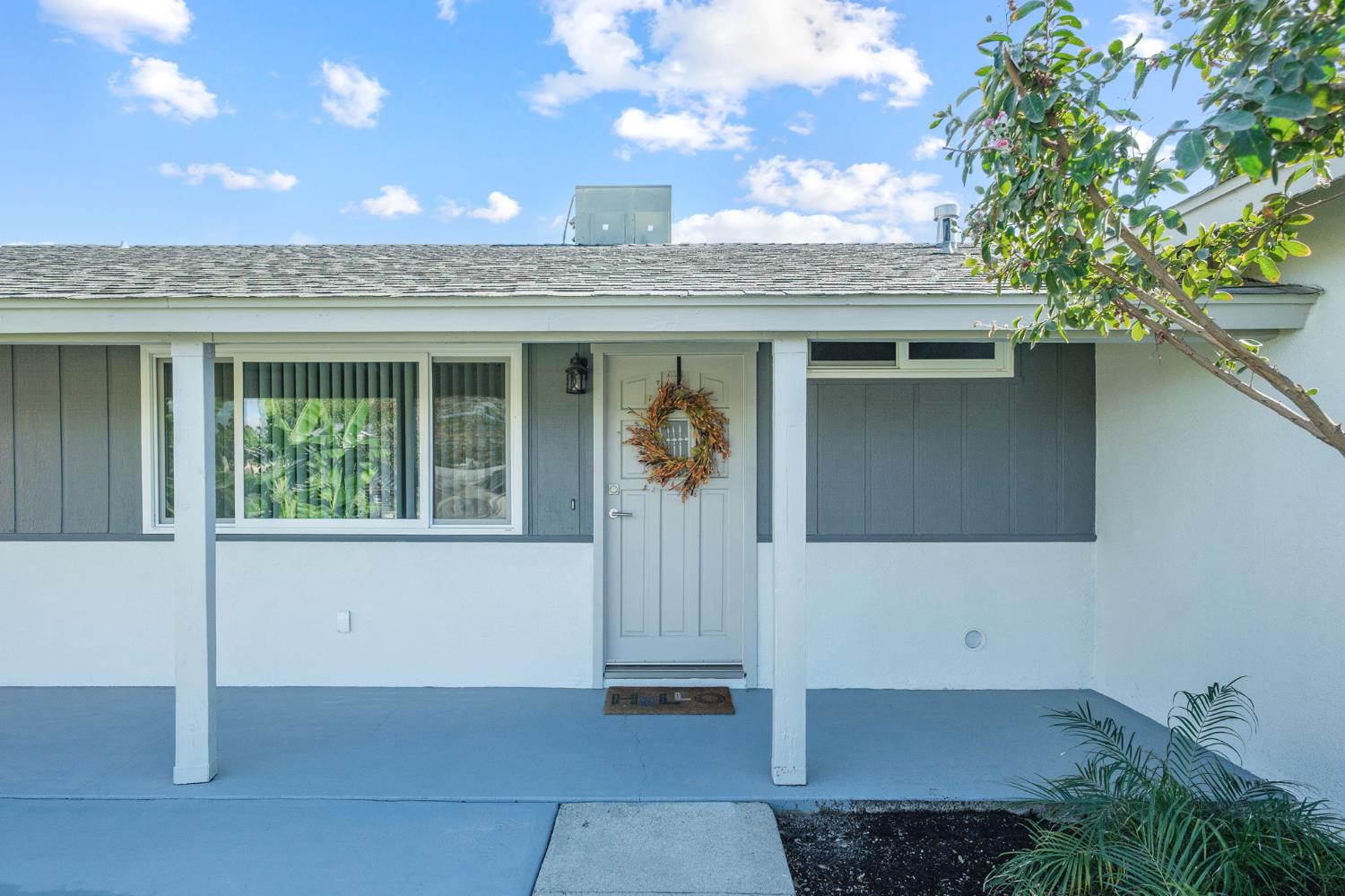 3062 Jasper Street Selma, CA 93662 - Photo 5 of 26 a view of a door of the house with a tree