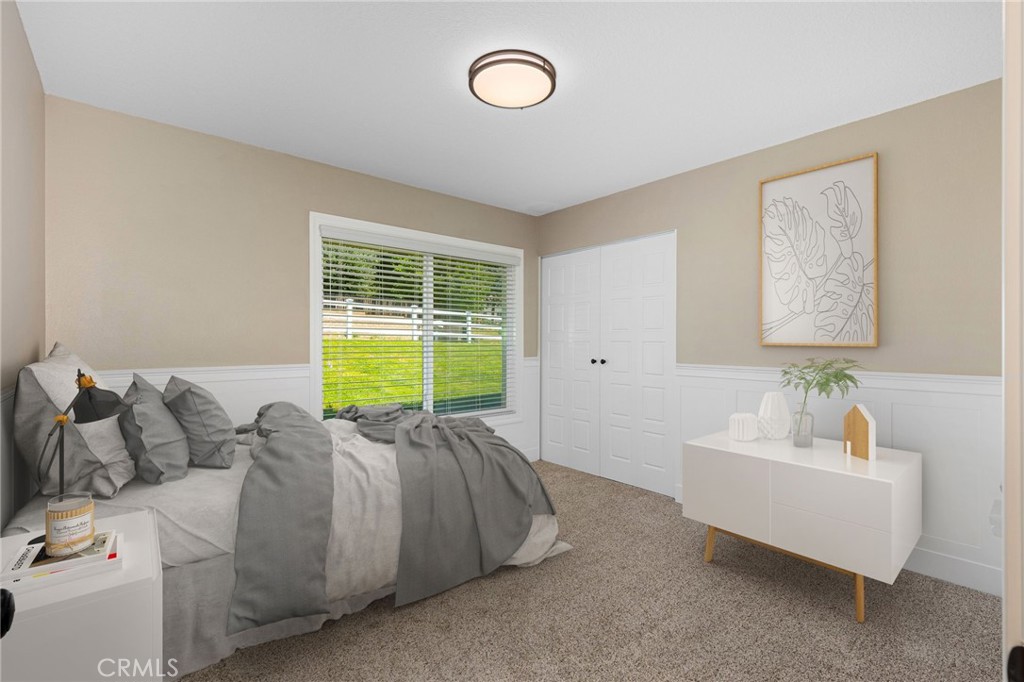 8729 Hillside Road Rancho Cucamonga, CA 91701 - Photo 36 of 66 a living room with furniture and a window