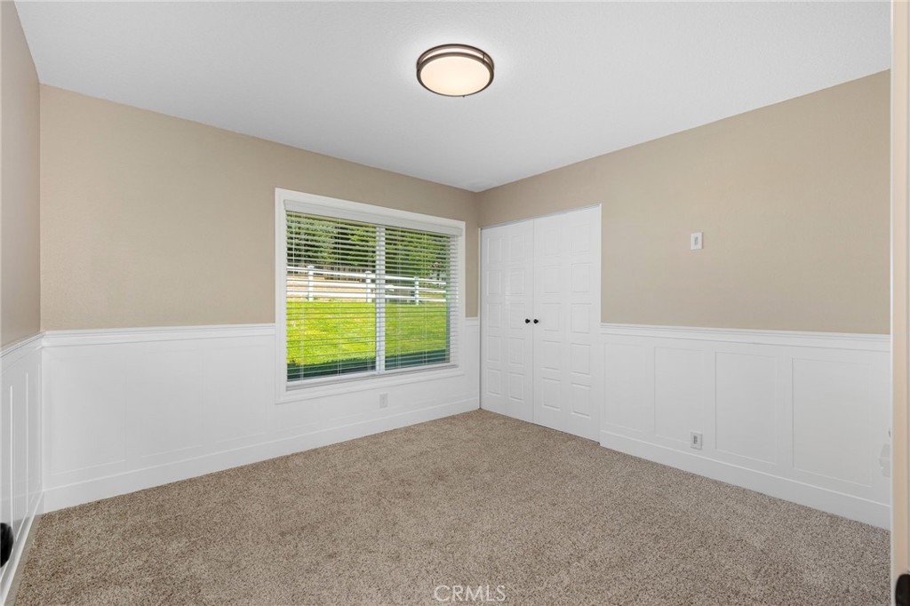 8729 Hillside Road Rancho Cucamonga, CA 91701 - Photo 37 of 66 an empty room with a window and a fan