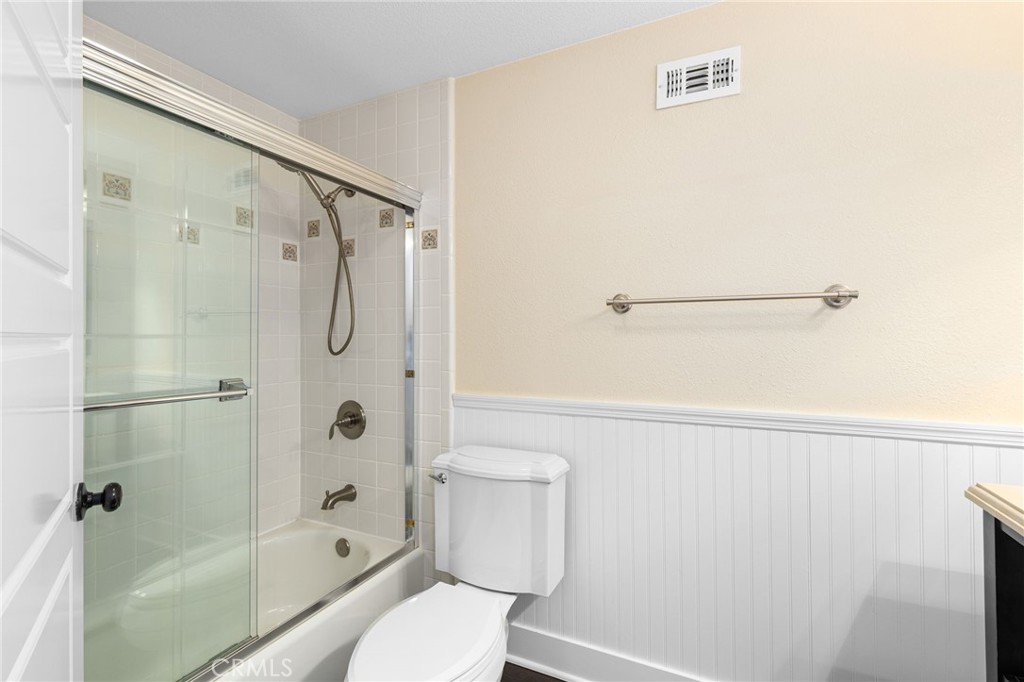 8729 Hillside Road Rancho Cucamonga, CA 91701 - Photo 39 of 66 a bathroom with a toilet and a shower