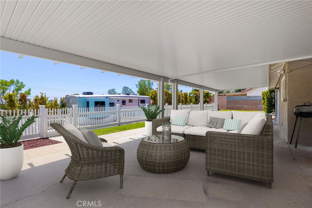 8729 Hillside Road Rancho Cucamonga, CA 91701 - Photo 40 of 66 a dining room with furniture and wooden floor
