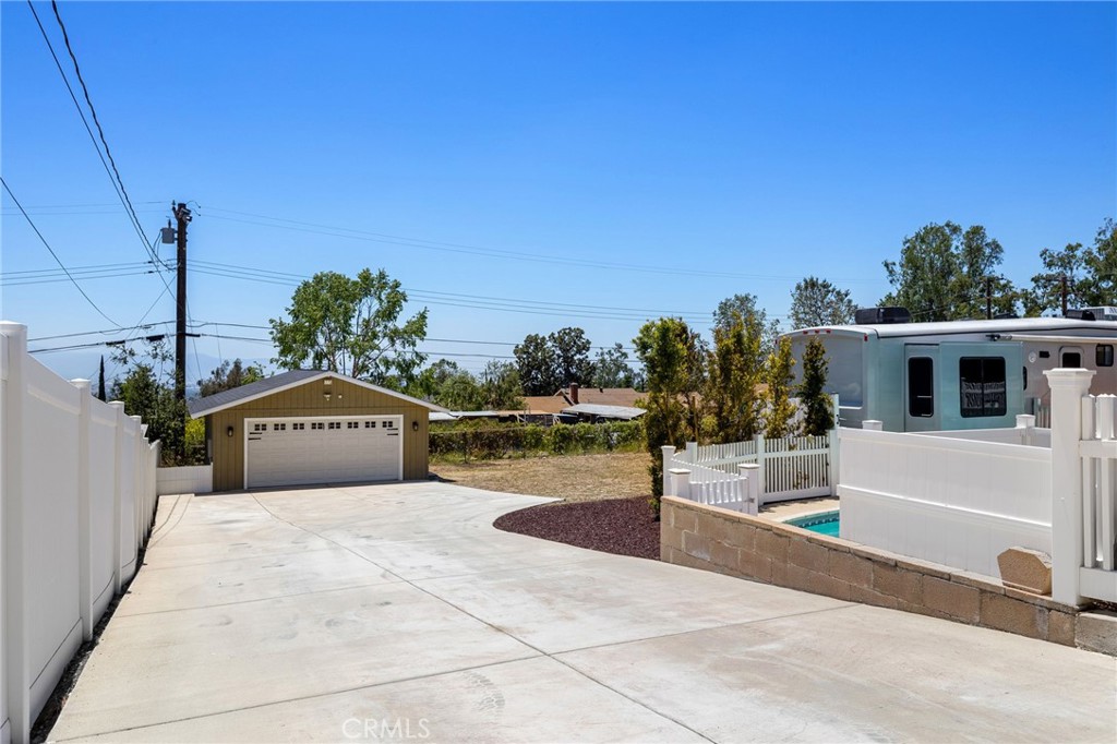 8729 Hillside Road Rancho Cucamonga, CA 91701 - Photo 47 of 66 a front view of a house with a yard