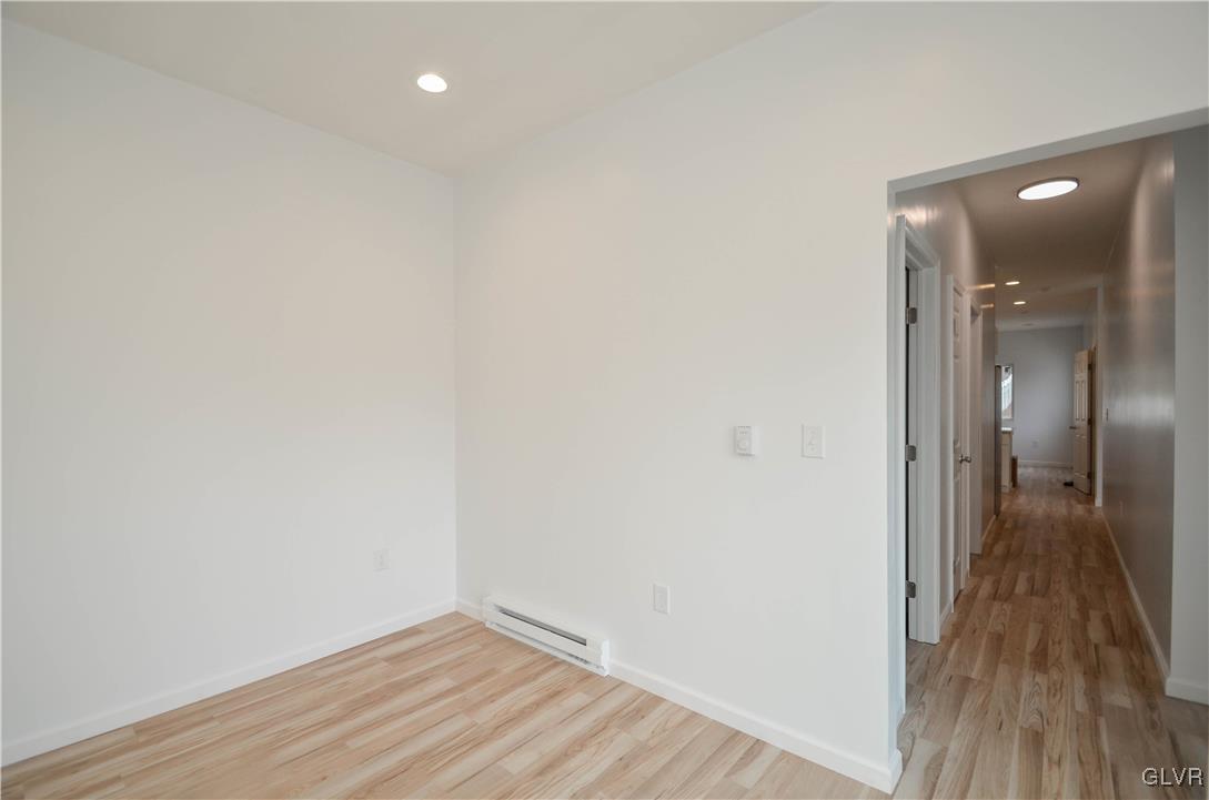 2 Elm Street Mount Pocono, PA 18344 - Photo 18 of 45 a view of a hallway with wooden floor