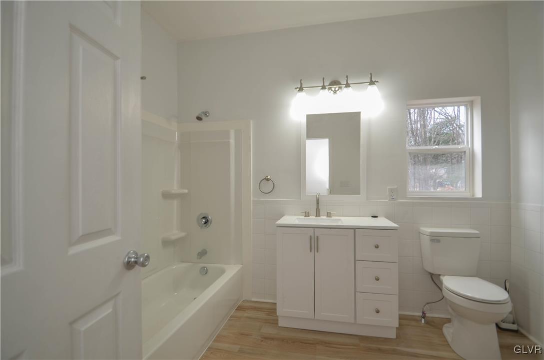 2 Elm Street Mount Pocono, PA 18344 - Photo 19 of 45 a bathroom with a tub sink toilet and mirror