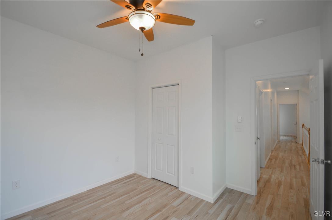 2 Elm Street Mount Pocono, PA 18344 - Photo 30 of 45 a view of a hallway with wooden floor