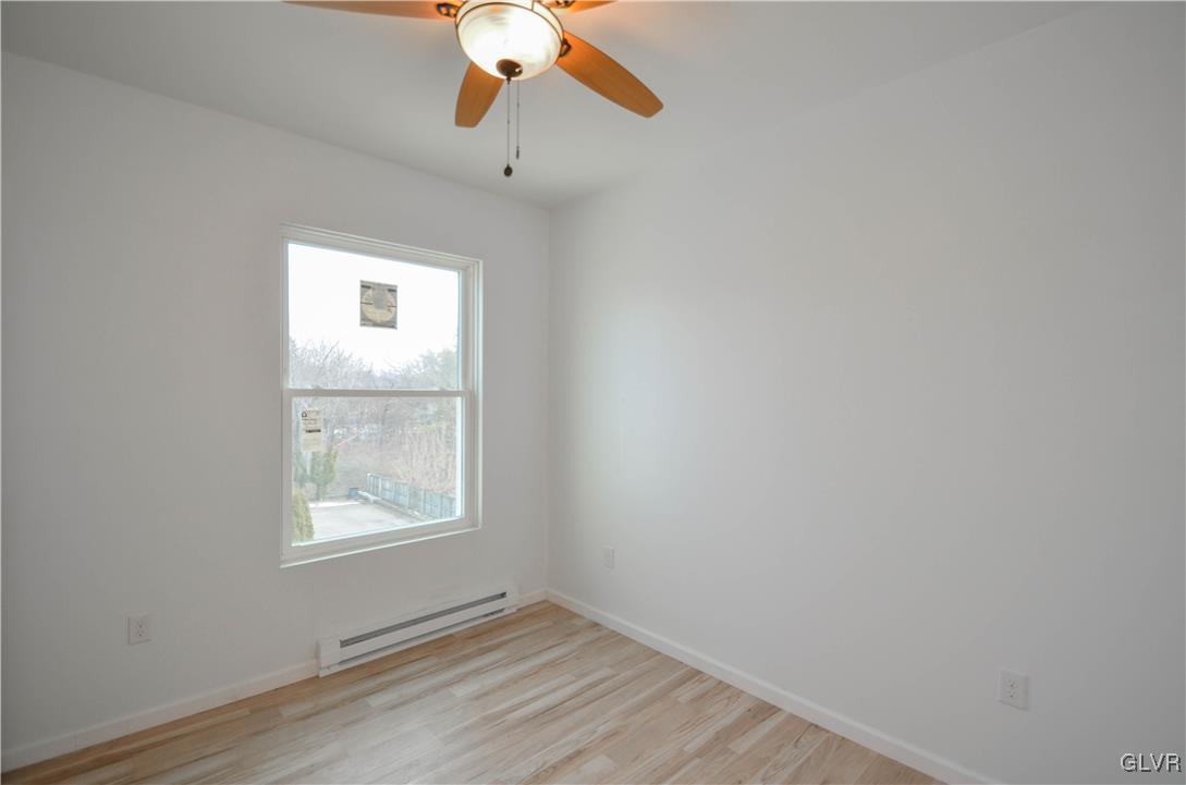 2 Elm Street Mount Pocono, PA 18344 - Photo 31 of 45 an empty room with a window and a fan
