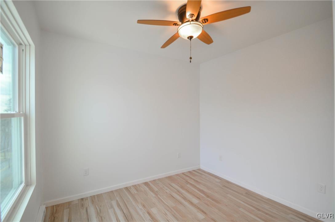 2 Elm Street Mount Pocono, PA 18344 - Photo 32 of 45 an empty room with a window and a fan
