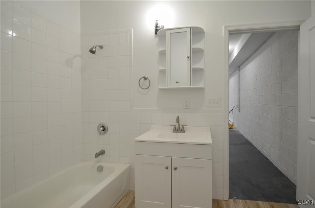 2 Elm Street Mount Pocono, PA 18344 - Photo 39 of 45 a bathroom with a sink a shower and a bathtub