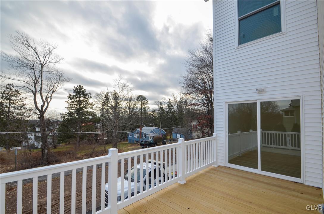 2 Elm Street Mount Pocono, PA 18344 - Photo 42 of 45 a balcony with trees in front of it