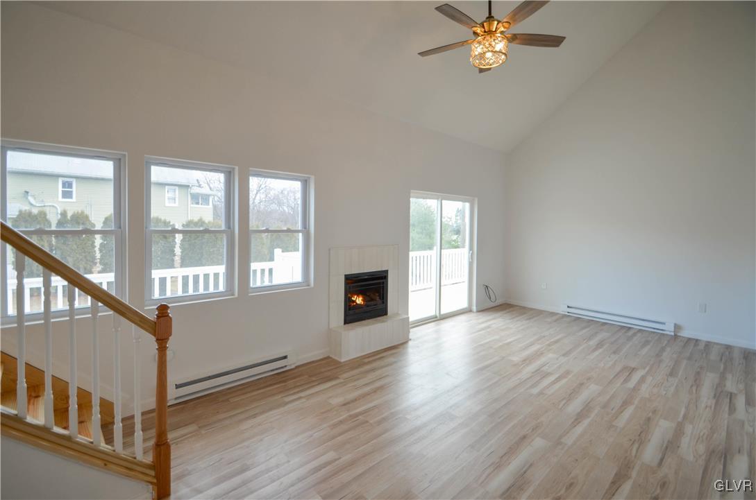 2 Elm Street Mount Pocono, PA 18344 - Photo 6 of 45 a view of an empty room with wooden floor and a window