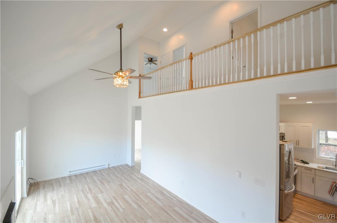 2 Elm Street Mount Pocono, PA 18344 - Photo 7 of 45 a view of a hallway with wooden floor and staircase
