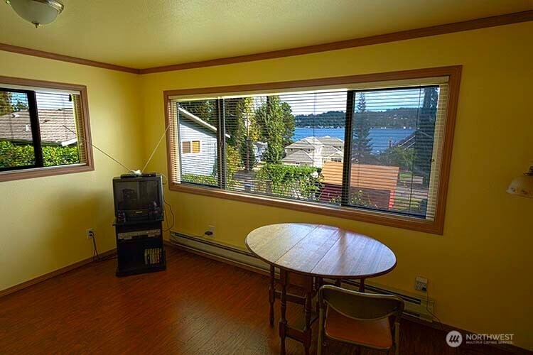 1357 Jacobsen Boulevard Bremerton, WA 98310 - Photo 3 of 7 a room with furniture and window