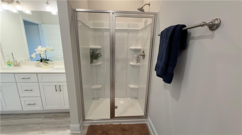620 Bald Ridge Circle Demorest, GA 30535 - Photo 15 of 43 a bathroom with a shower and a sink