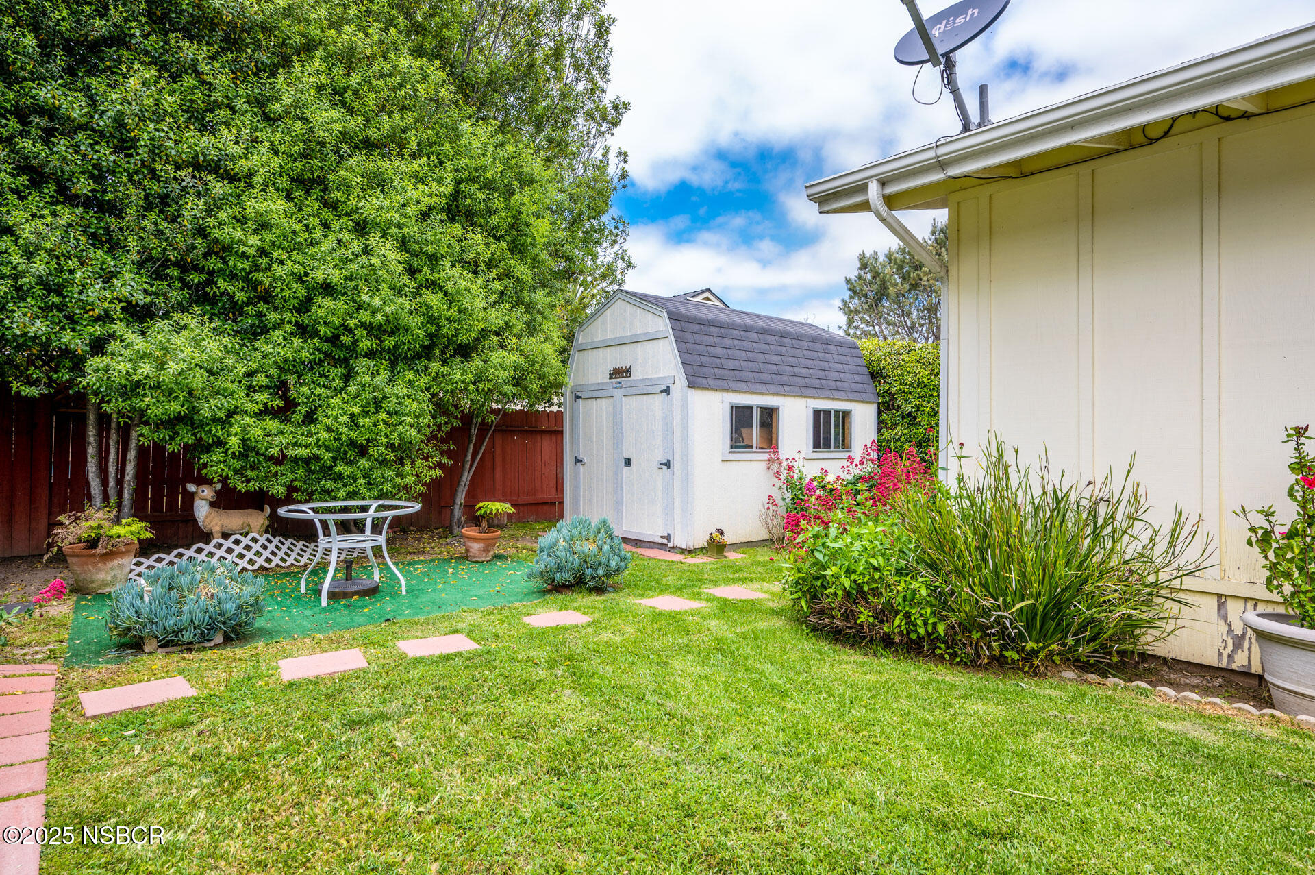 414 West Walnut Avenue Lompoc, CA 93436 - Photo 14 of 17 front view of a house with a yard
