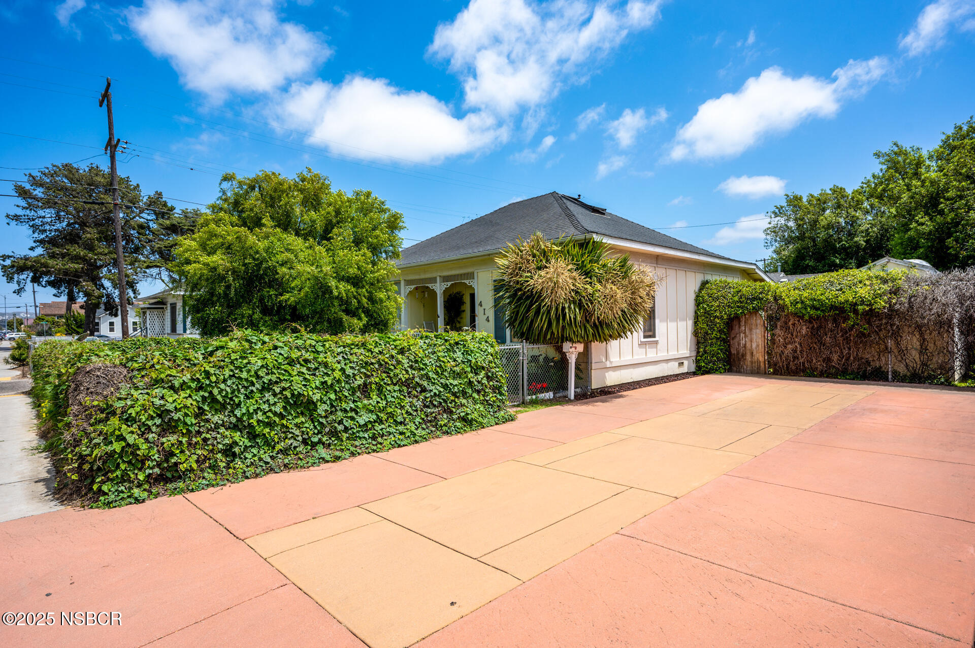 414 West Walnut Avenue Lompoc, CA 93436 - Photo 17 of 17 a front view of a house with a yard