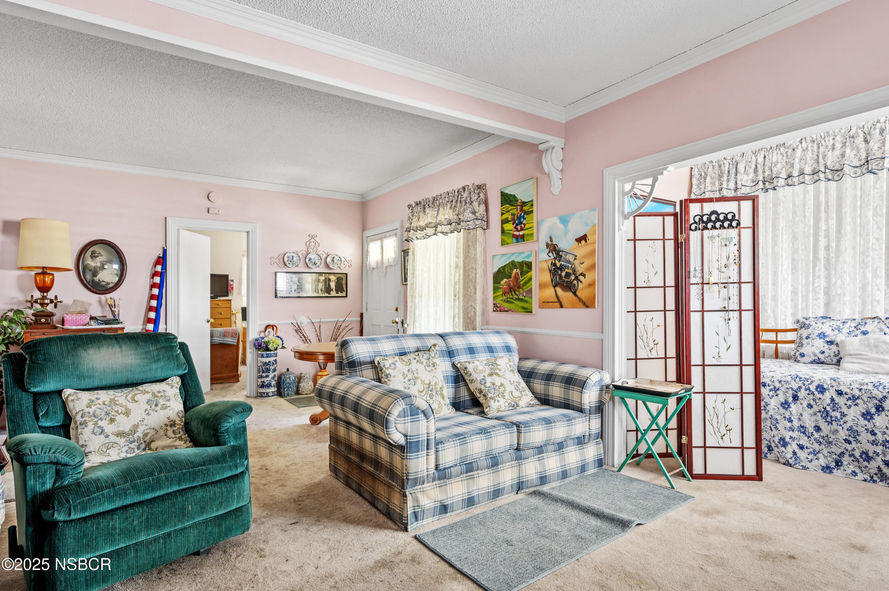 414 West Walnut Avenue Lompoc, CA 93436 - Photo 5 of 17 a living room with furniture and a table