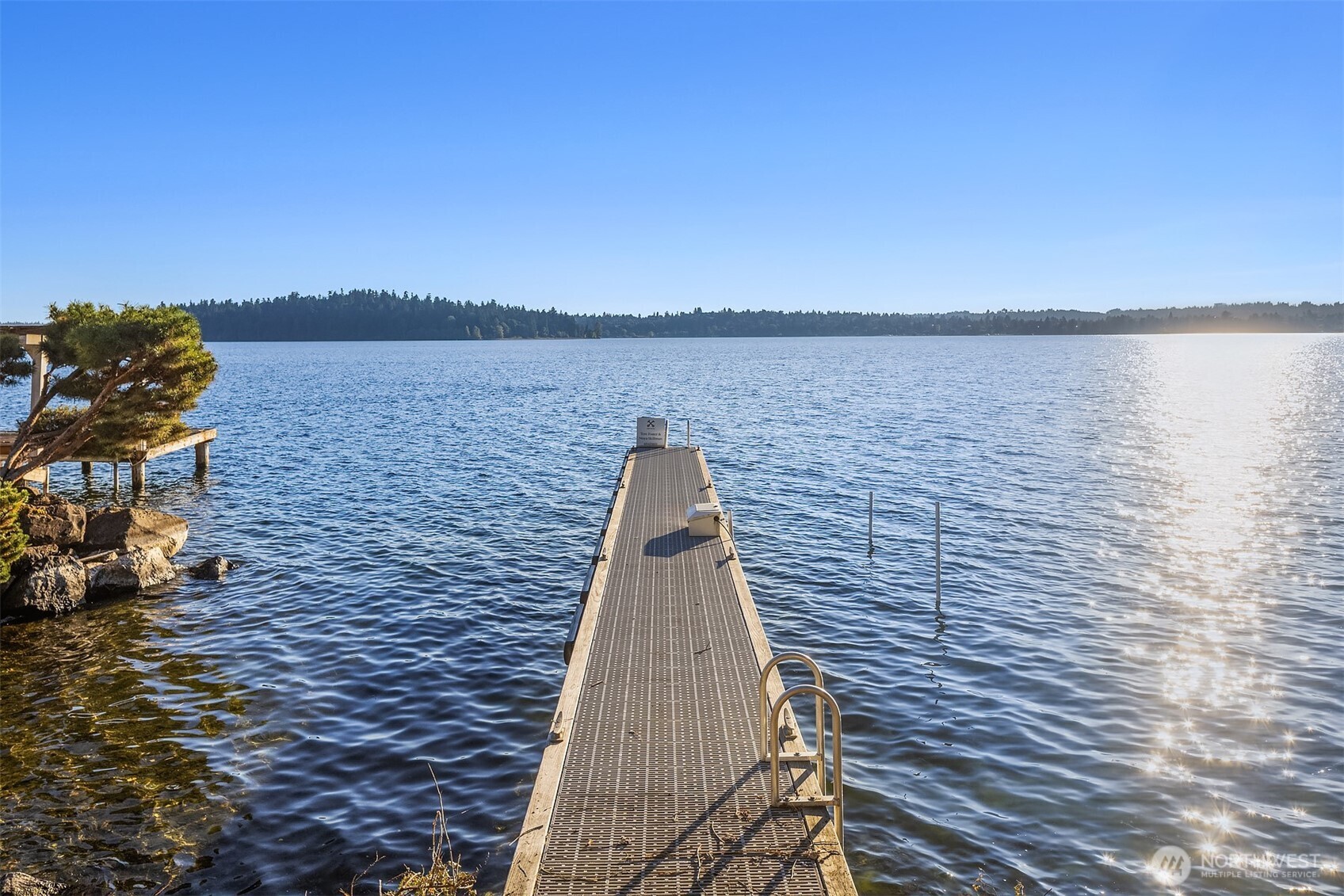 4045 West Mercer Way Mercer Island, WA 98040 - Photo 20 of 25 a view of a lake with a city view