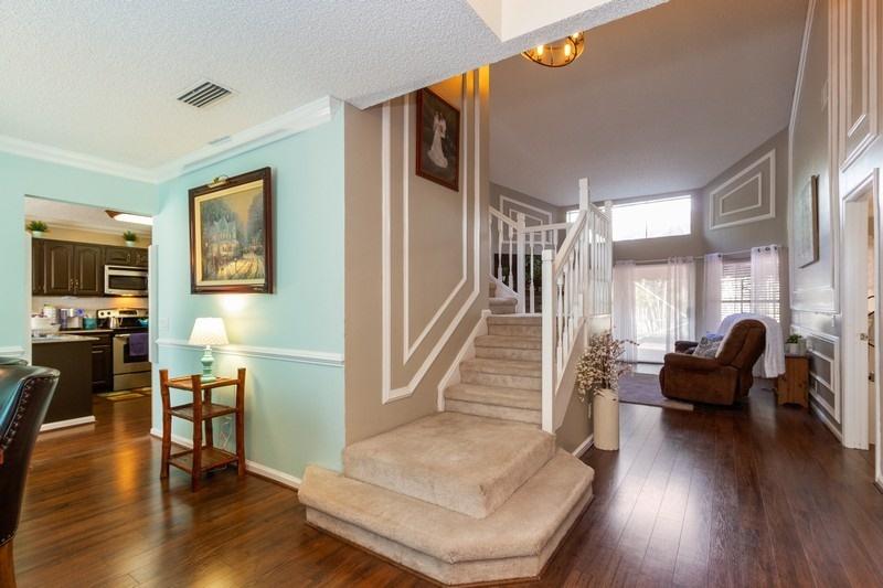 10611 Bexley Boulevard Boca Raton, FL 33428 - Photo 3 of 25 02_10611BexleyBlvd_32_Foyer_FlexMLS800x6