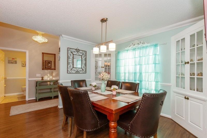10611 Bexley Boulevard Boca Raton, FL 33428 - Photo 7 of 25 06_10611BexleyBlvd_369001_DiningRoom_Fle