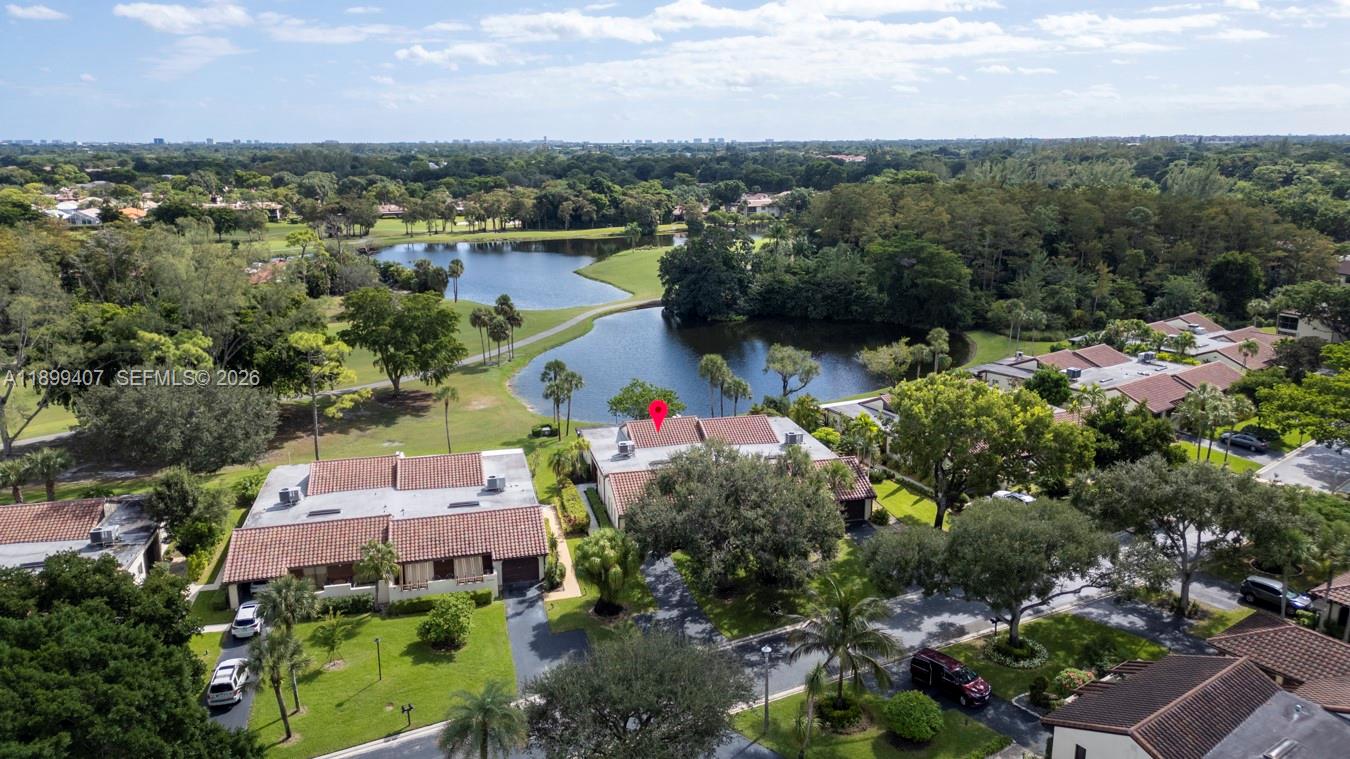 21686 Arriba Real, Unit 40A Boca Raton, FL 33433 - Photo 3 of 53 an aerial view of a houses with a lake view