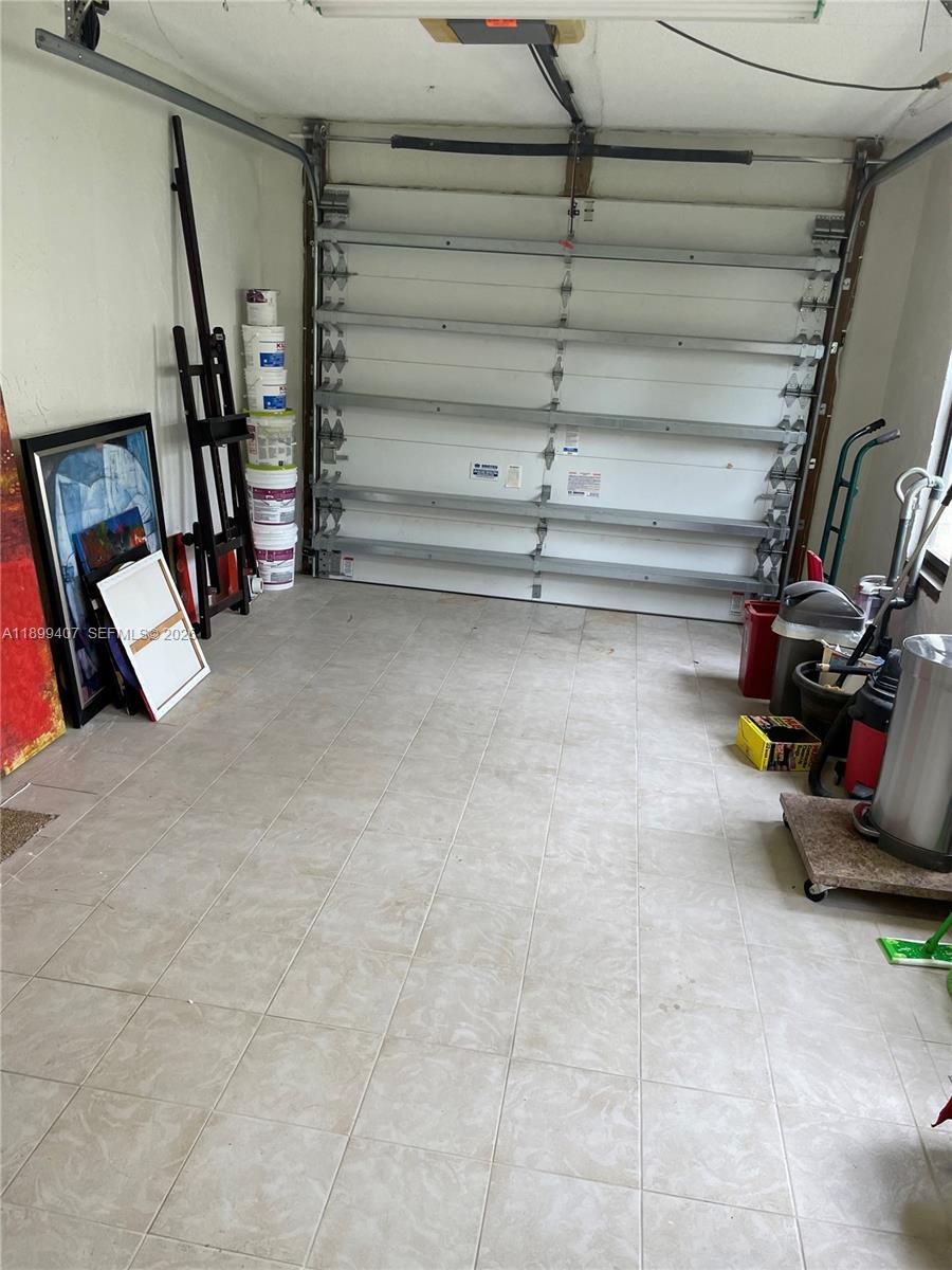 21686 Arriba Real, Unit 40A Boca Raton, FL 33433 - Photo 45 of 53 a view of storage and utility room