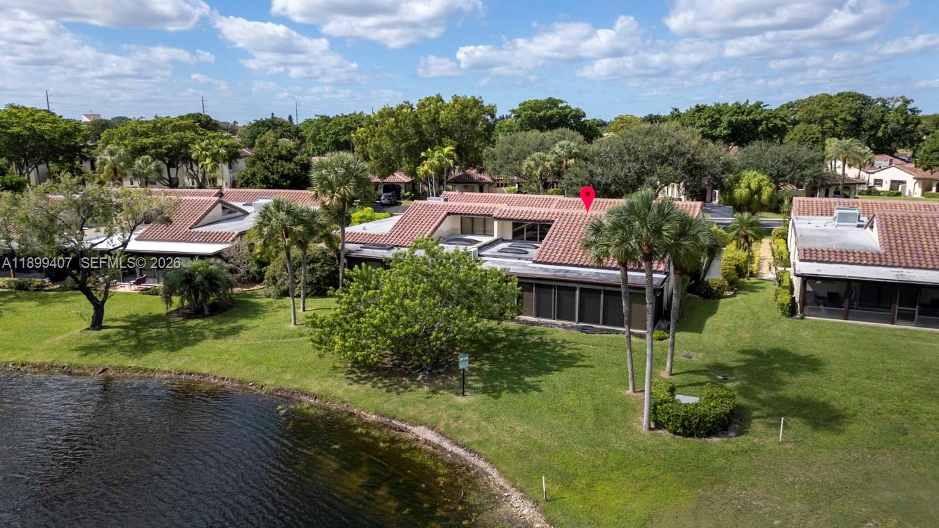 21686 Arriba Real, Unit 40A Boca Raton, FL 33433 - Photo 51 of 53 an aerial view of house with a yard